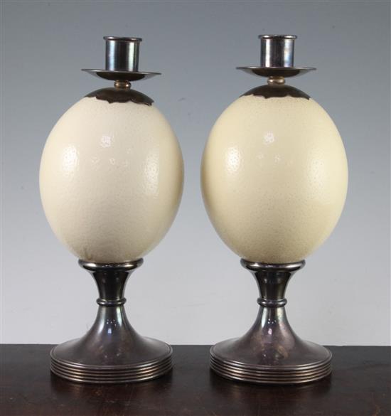 Anthony Redmile. A pair of ostrich egg candlesticks, 11in.